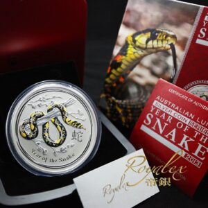 2013 1 Kilo Colorized Australian Silver Lunar Snake Gemstone Eye Coin (BU, Box + CoA) 2013 1 Kilo Colorized Australian Silver Lunar Snake Gemstone Eye Coin (BU, Box + CoA)
