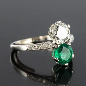 1930s French Platinum Art Deco Emerald Diamond "You and Me" Ring