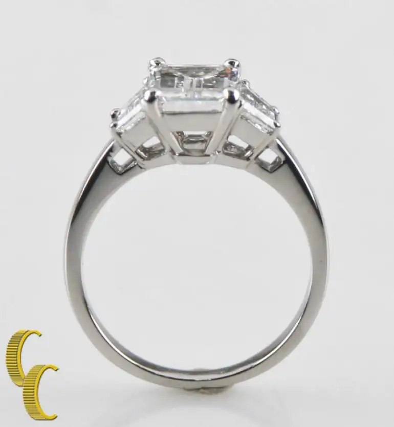 2.10 Carat Emerald Cut Diamond 3-Stone Platinum Ring with GIA Certified 2.10 Carat Emerald Cut Diamond 3-Stone Platinum Ring with GIA Certified