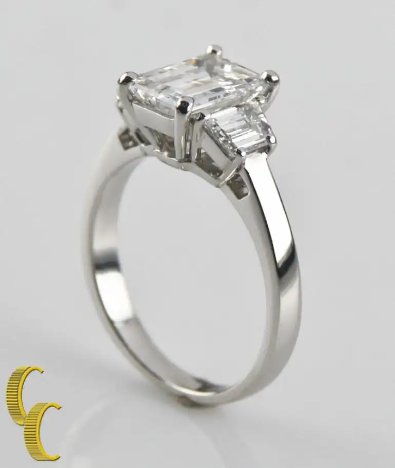 2.10 Carat Emerald Cut Diamond 3-Stone Platinum Ring with GIA Certified 2.10 Carat Emerald Cut Diamond 3-Stone Platinum Ring with GIA Certified