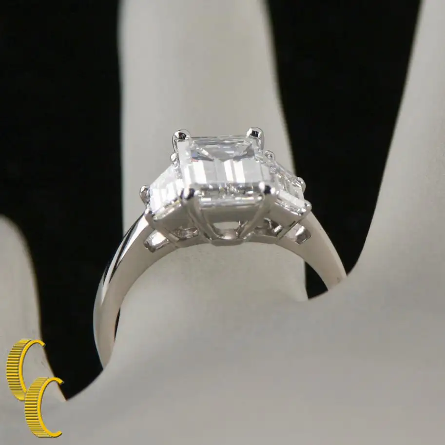 2.10 Carat Emerald Cut Diamond 3-Stone Platinum Ring with GIA Certified 2.10 Carat Emerald Cut Diamond 3-Stone Platinum Ring with GIA Certified