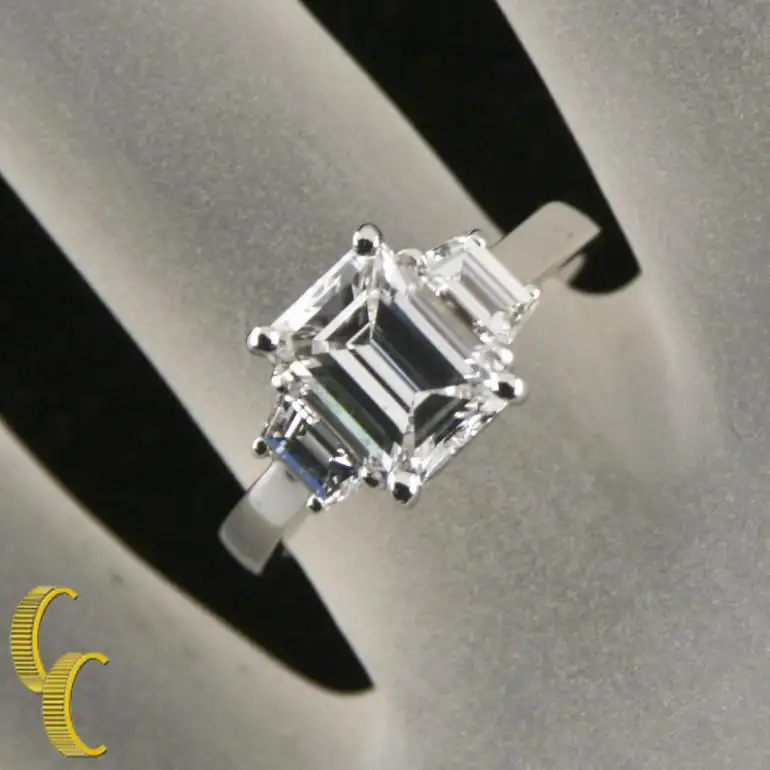 2.10 Carat Emerald Cut Diamond 3-Stone Platinum Ring with GIA Certified 2.10 Carat Emerald Cut Diamond 3-Stone Platinum Ring with GIA Certified