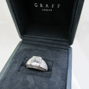 Graff GIA Certified Emerald Cut 4.03 Carat Diamond Fancy Cut Diamond Set Ring Graff GIA Certified Emerald Cut 4.03 Carat Diamond Fancy Cut Diamond Set Ring