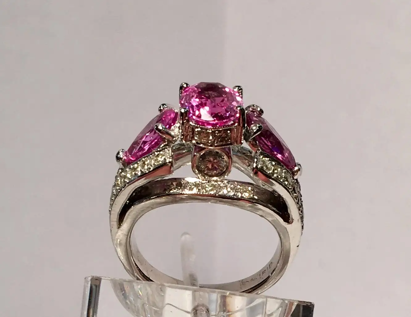 Spectacular Vivid Pink Sapphire Diamond Platinum Three-Stone Ring Spectacular Vivid Pink Sapphire Diamond Platinum Three-Stone Ring