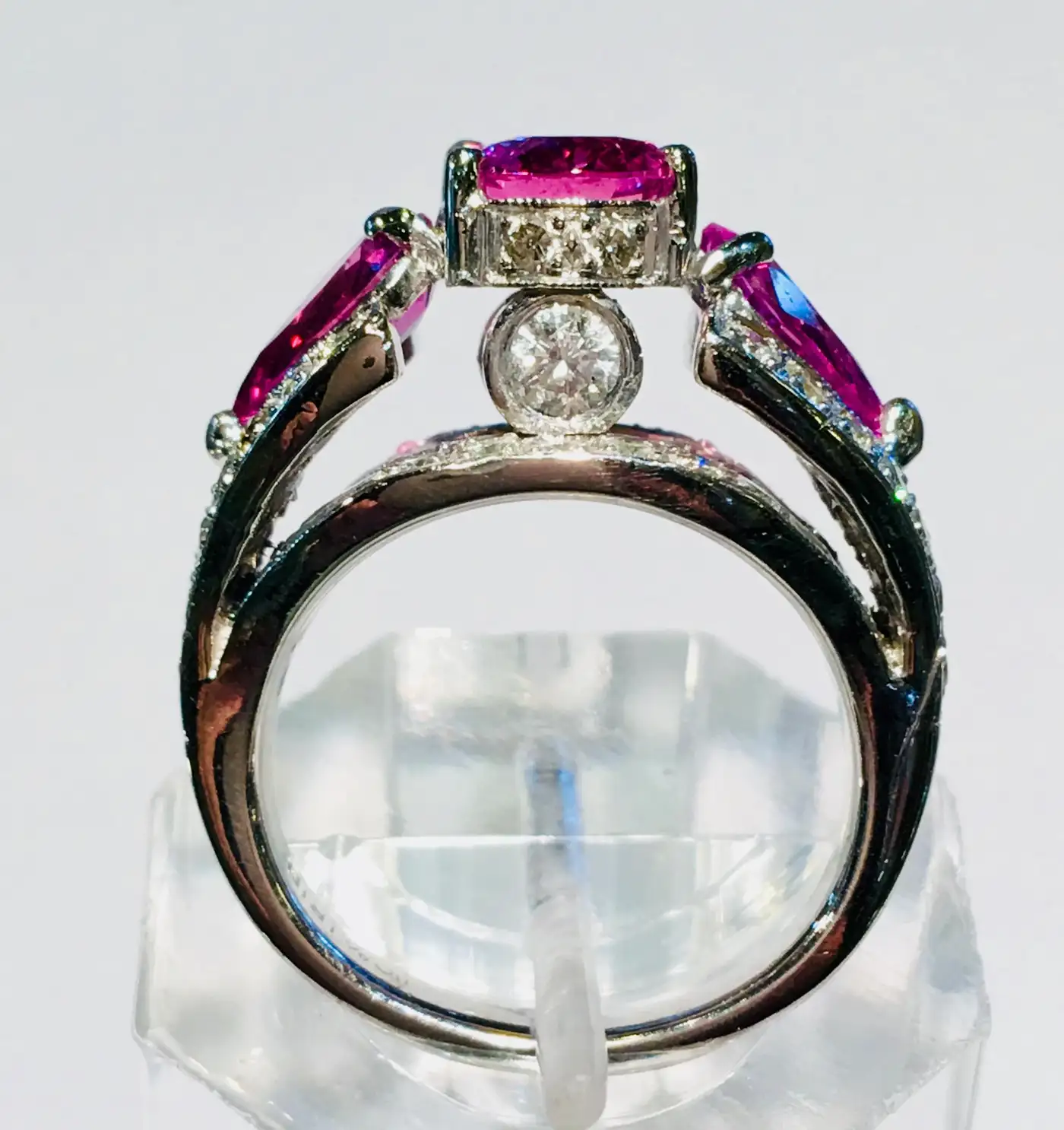 Spectacular Vivid Pink Sapphire Diamond Platinum Three-Stone Ring Spectacular Vivid Pink Sapphire Diamond Platinum Three-Stone Ring